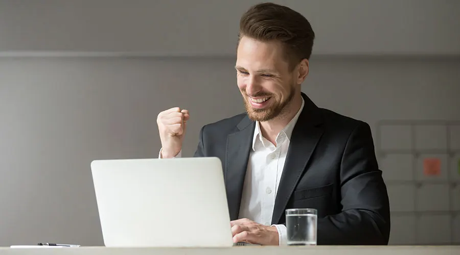 A relieved client at a laptop